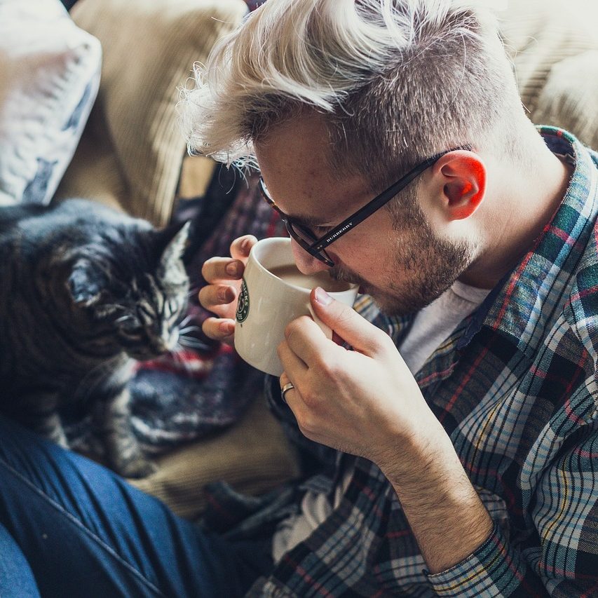 man, sofa, coffee